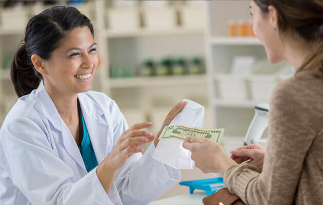 woman pharmacy cash large