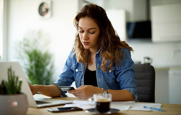 woman paying bills large