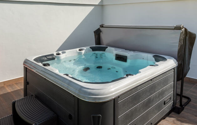 hot tub with cover on deck large