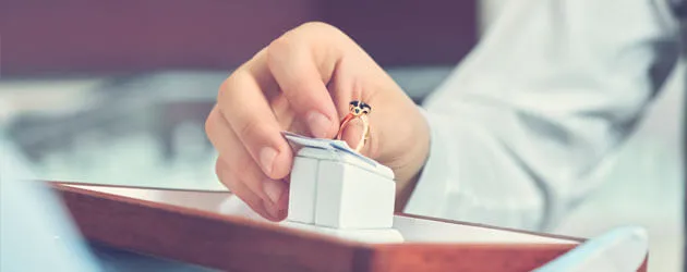 hand picking engagement ring medium