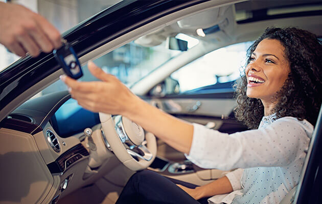 woman buying car large