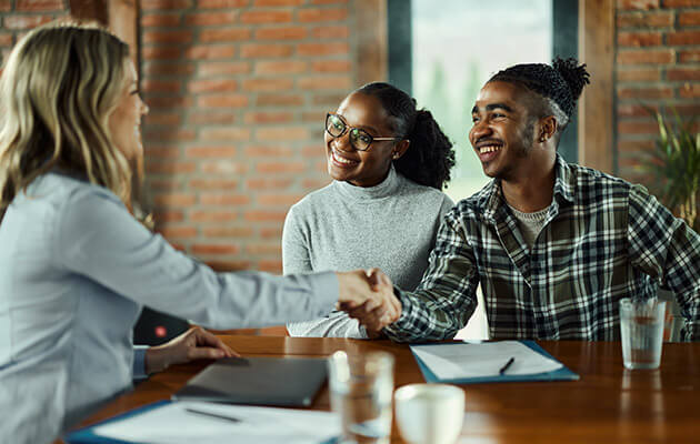 Large Agent Consulting And Shake Hands With Customers