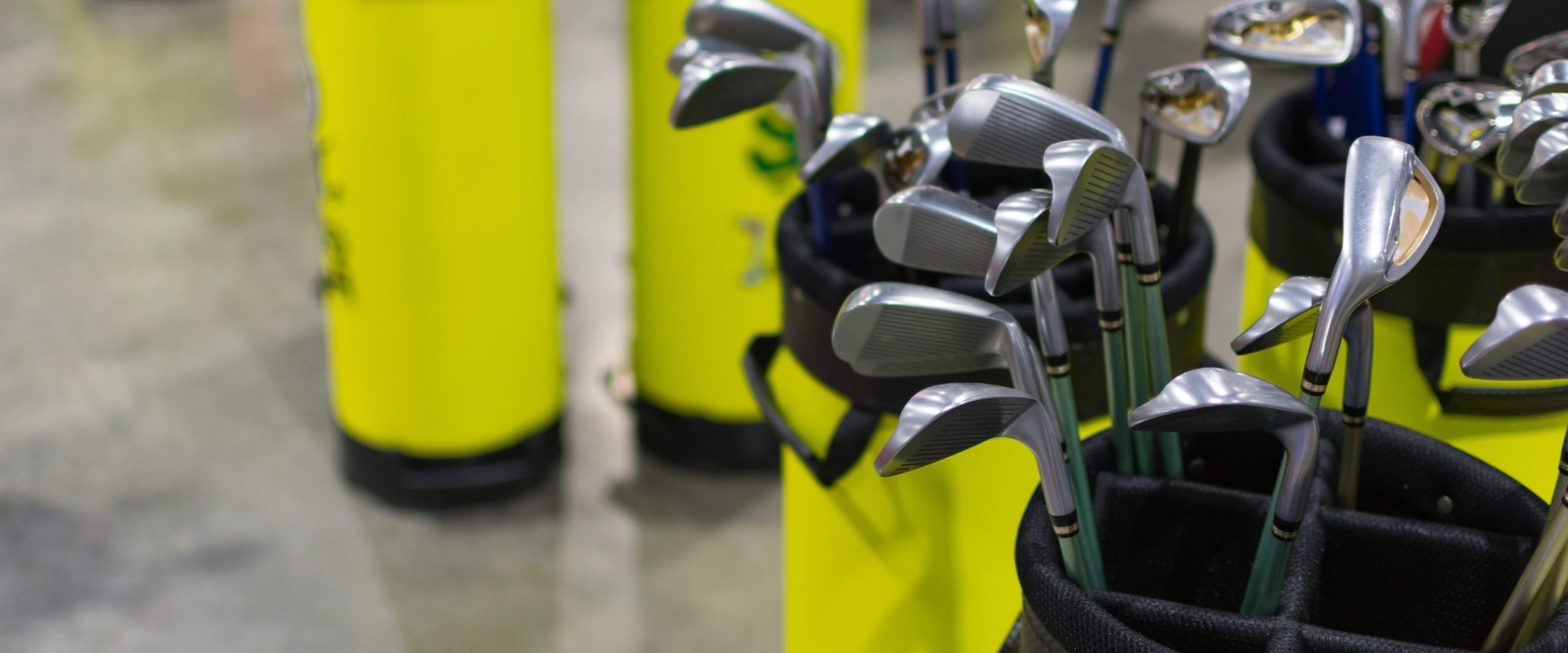 Many types of golf club in golf shop.