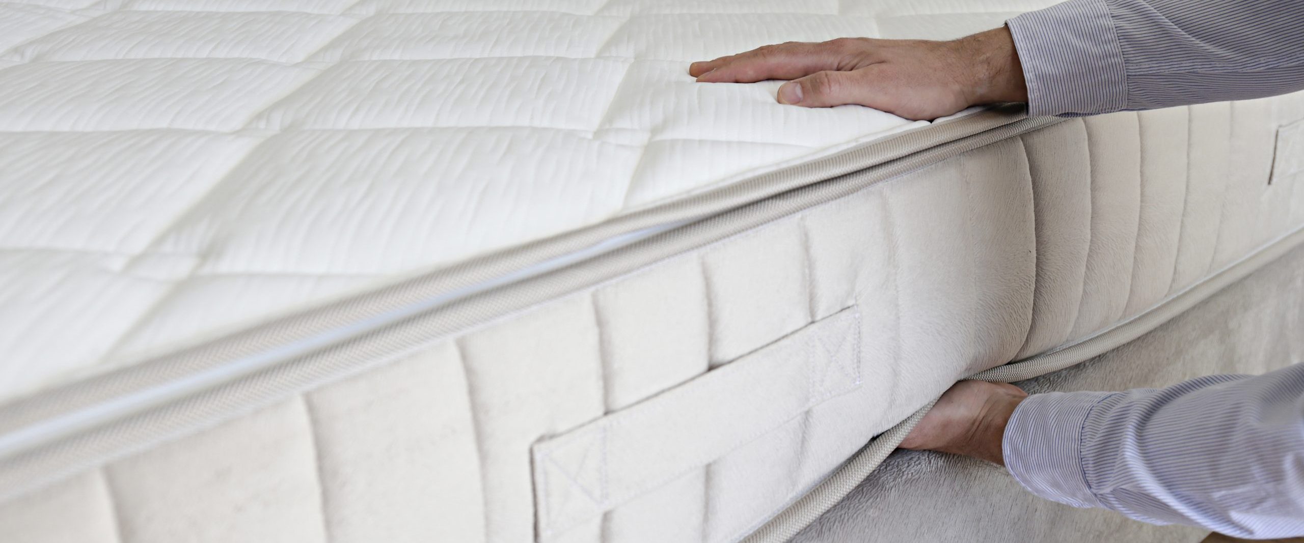 Man choosing a mattress.