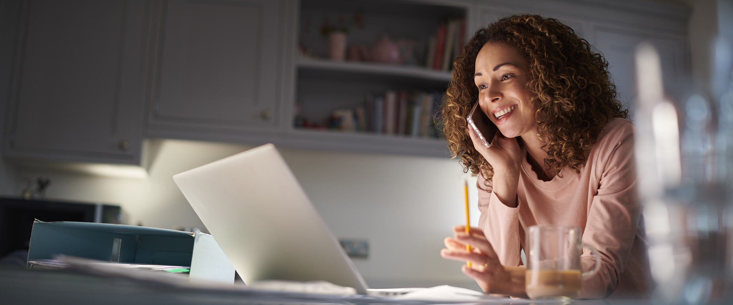 woman phone laptop hero watermark