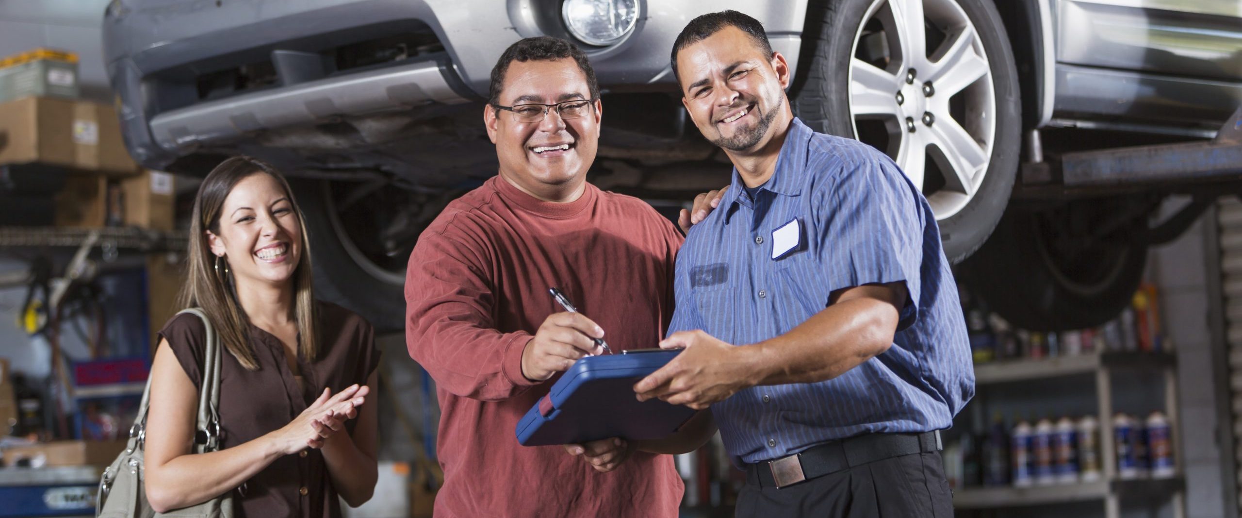 Couple at auto repair shop