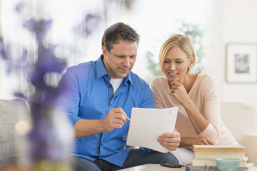 couple reviewing finances large