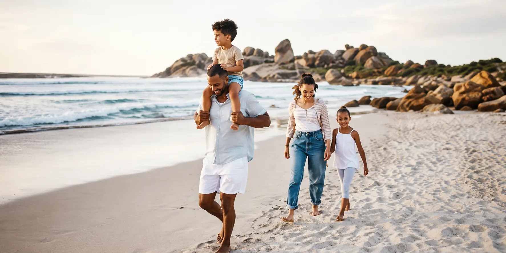 Medium Happy Family Walking On The Beach